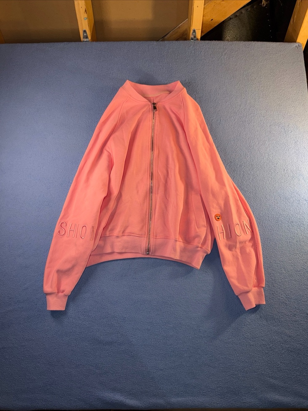 Pink Zip-Up Bomber Jacket with Embroidered Sleeve Detail